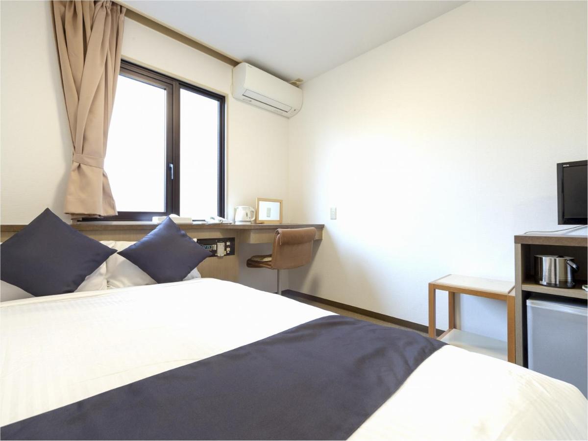 Business Hotel Yanagi Kitakyushu Kokura Buitenkant foto