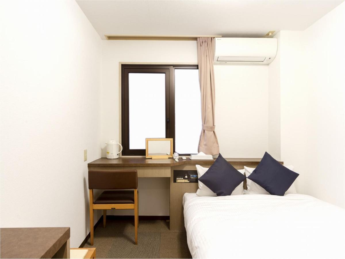 Business Hotel Yanagi Kitakyushu Kokura Buitenkant foto